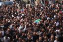 People gather for the funerals of Samer El Shafei and Hamza Kharyoush in the occupied West Bank