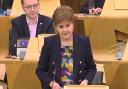 Nicola Sturgeon received applause in the Scottish Parliament for her work on The Promise