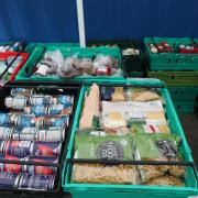 The SNP have slammed the record number of emergency food parcels delivered in Scotland