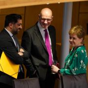 John Swinney with Humza Yousaf and Nicola Sturgeon just before the Holyrood vote that saw him appointed First Minister