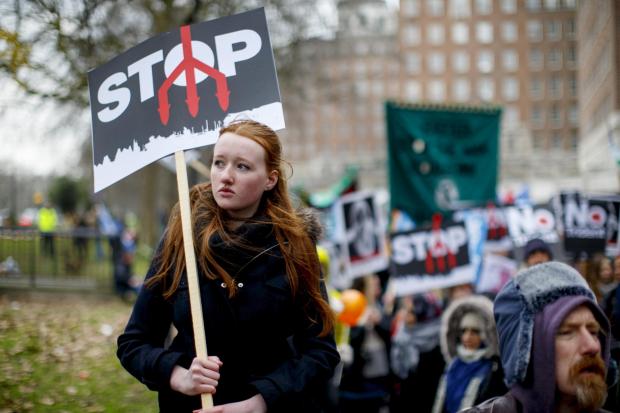 The National: LONDON, UNITED KINGDOM - FEBRUARY 27: Members of public protesting against Britain's nuclear weapons system Trident and demanding the parliament to vote against renewing the nuclear base in Scotland, in London, England on February 27, 2016. (Photo by