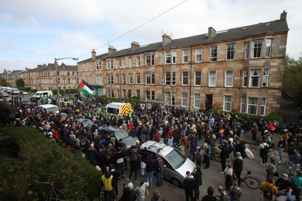 People in Glasgow surrounded a Home Office van to prevent it from leaving