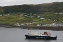 A Caledonian MacBrayne (CalMac) ferry leaves the Isle of Skye