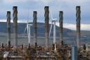 Wind turbines stand alongside Mossmorran Ethleyne Plant