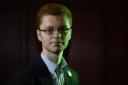 Ross Greer is urging SNP ministers to follow England's lead on combatting harassment in schools