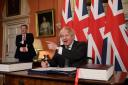 Boris Johnson signed the UK-EU Trade and Cooperation Agreement in late 2020