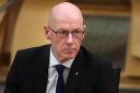 John Swinney has taken control of the finance brief while Kate Forbes is on maternity leave