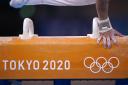 A competitor on the Pommel Horse during the men's artistic gymnastics at Tokyo 2020