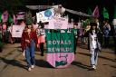 Children march to Buckingham Palace demanding royals rewild land