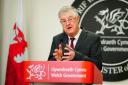 Welsh First Minister Mark Drakeford defended his comments describing England as a 'global outlier' on Covid-19