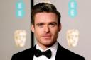 Game of Thrones star Richard Madden is among the favourites to take over as James Bond