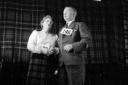 23rd July 1955:  An elderly couple competing in a Scottish folk singing contest, known as a Gaelic Mod, in the Hebrides.