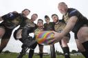 From left: Raptors rugby members Marc Wook, Frankie Miller, Andrew Fry, performer Ziggi Battles,  Ross Lockerbie and Brian McGraw at Clydebank Social Hub where a drag fundraiser will take place. Picture: Gordon Terris