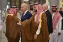 US President Joe Biden and Saudi Crown Prince Mohammed bin Salman arriveat a hotel in Saudi Arabia's Red Sea coastal city of Jeddah