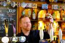 Andrew Black behind the bar at the Commercial Inn, which has just been named Scottish pub of the year by the Campaign for Real Ale (CAMRA). Photo: Jim Payne.