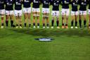 Scotland women's national team lay a jersey in memory of Siobhan Cattigan before their game against Colombia in February. Picture: Getty