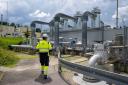An employee of Uniper Energy Storage walks through the natural gas storage facility in Bierwang, southern Germany