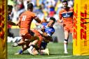 Edinburgh try to get to grips with the Stormers' Angelo Davids in Cape Town