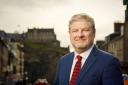 Unionists have fumed over Angus Robertson's trips to promote Scotland internationally
