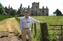 Jack Nicklaus in front of Ury Castle