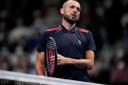 Dan Evans looks disappointed during his loss to Miomir Kecmanovic