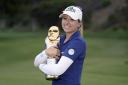 Jodie Ewart Shadoff shows off the unusual prize on offer at the Mediheal Championship