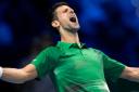 Novak Djokovic celebrates beating Daniil Medvedev