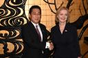 Liz Truss shakes hands with Prime Minister of Japan, Fumio Kishida