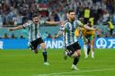 Lionel Messi, right, celebrates after firing Argentina into a first-half lead against Australia