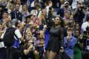 Serena Williams waves goodbye after bowing out of the US Open