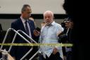Brazil’s President Luiz Inacio Lula da Silva walks in Planalto Palace after it was stormed by supporters of Brazil’s former president Jair Bolsonaro