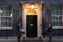 A drummer and a bagpiper outside 10 Downing Street ahead of a Burns night reception