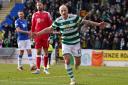 Celtic midfielder Aaron Mooy celebrates after scoring in the 4-1 win over St Johnstone in Perth today