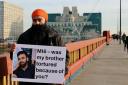 Gurpreet Singh Johal standing near MI6 HQ questioning whether the spy agency played a role in his brother's imprisonment in India
