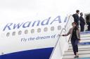 Home Secretary Suella Braverman arrives at Kigali International Airport (PA)