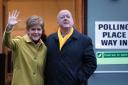 Then SNP leader Nicola Sturgeon with husband Peter Murrell casting their votes in the 2019 General Election at Broomhouse Park Community Hall in Glasgow