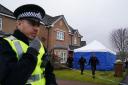 Officers from Police Scotland at the home of former chief executive  of the SNP Peter Murrell, in Bailleston, Glasgow, after he was arrested