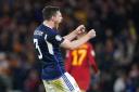 Scotland's Andrew Robertson celebrates following the UEFA Euro 2024 qualifying group A match at Hampden Park against Spain