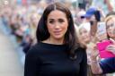 Meghan Markle has rejected a suggestion that she is missing the King's coronation over a letter she