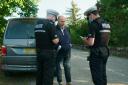 Anders Holch Polvsen talking to police after being caught speeding
