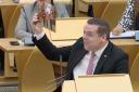 Douglas Ross held up the picture of Humza Yousaf