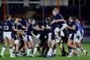 Scotland players celebrate their second Six nations win in eight days, after beating Ireland in Edinburgh