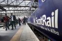 Climate campaigners have joined a rail union to demand an inquiry into Scotland's public transport and rail network