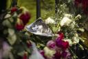 A photograph and flowers left at Tina Turner's Swiss villa after her death this week