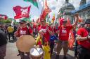 Yes Cymru  supporters march through Cardiff