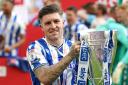 Josh Windass with the trophy