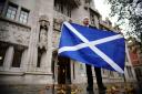 A Scottish independence supporter outside the UK Supreme Court in London