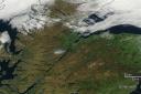 Satellite images from Nasa show the plume of smoke from the blaze drifting towards the loch