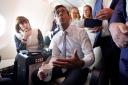 Rishi Sunak with political journalists on his flight to the US (Niall Carson/PA)