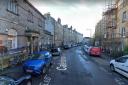 Caledonian Crescent in the Dalry area of Edinburgh was closed off after 'suspected grenades' were found in a home